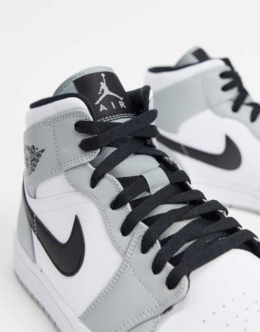 Nike Air Jordan 1 Mid trainers in grey/white