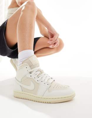 Nike Air Jordan 1 Mid trainers in off white and stone 84.49 Grazia