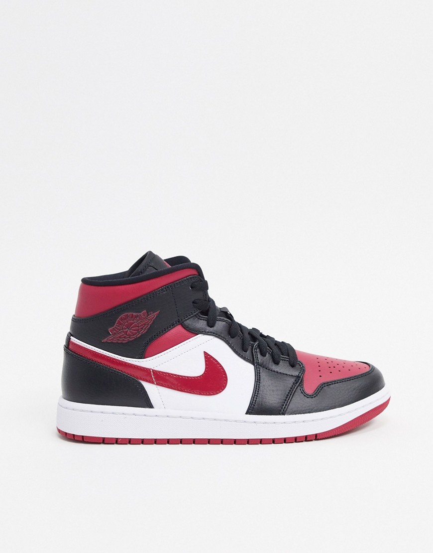 Nike Air Jordan 1 Mid trainers in silver and red