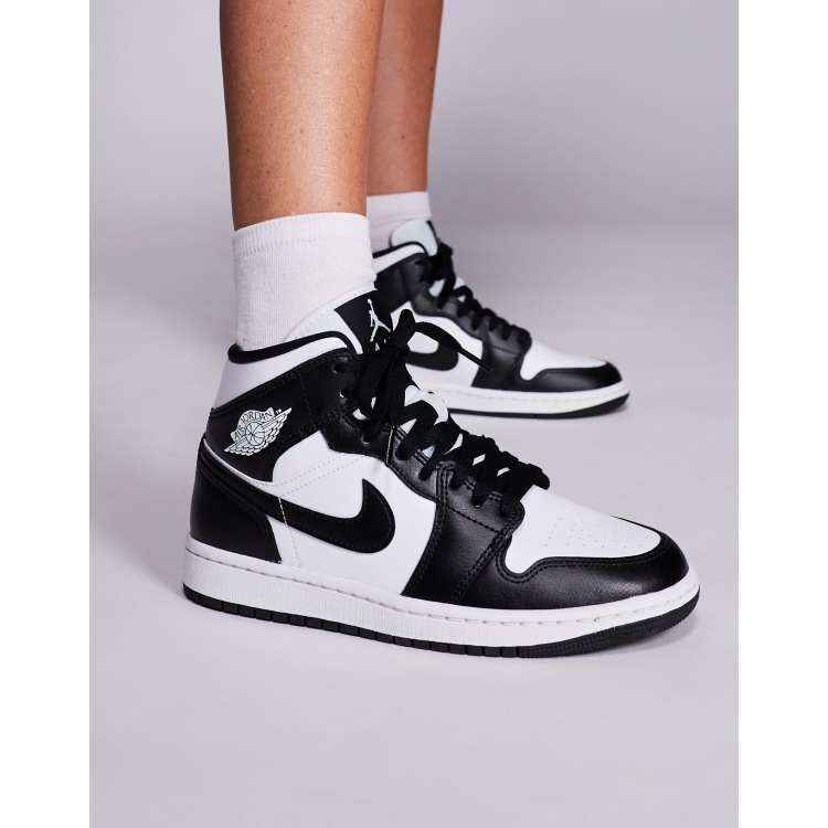 Nike Air Jordan 1 Mid trainers in white and black | ASOS