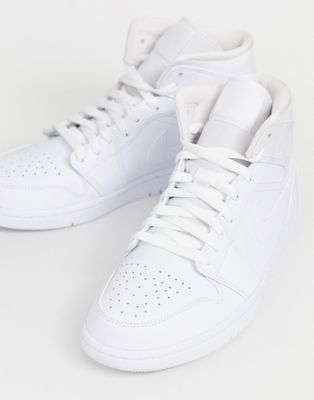 Nike Air Jordan 1 mid trainers in white | ASOS