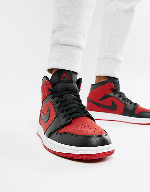 Джорданы кроссовки низкие. Nike Air Jordan 1 Mid красные.