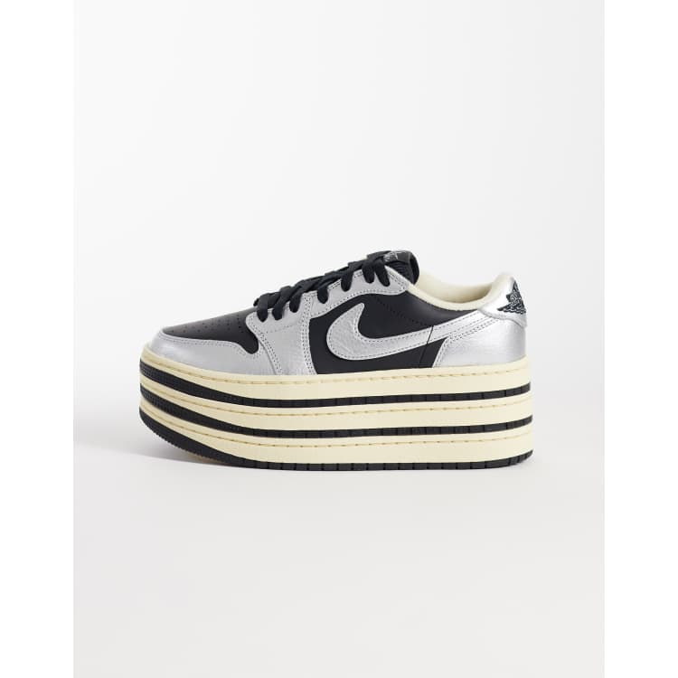 Nike Air Jordan 1 triple stack sneakers with metallic detailing in