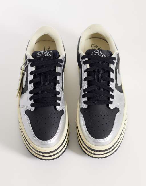 Nike Air Jordan 1 triple stack sneakers with metallic detailing in