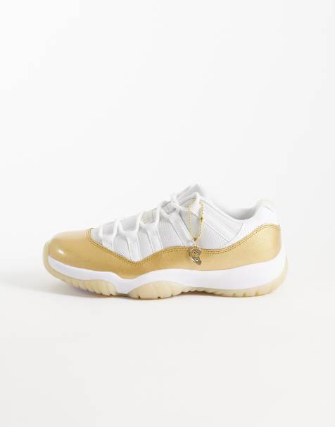 Nike Air Jordan 11 Retro Low sneakers in white and gold - view 1
