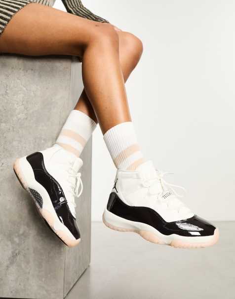 Nike Air Jordan 11 Retro sneakers in off white and brown - view 1