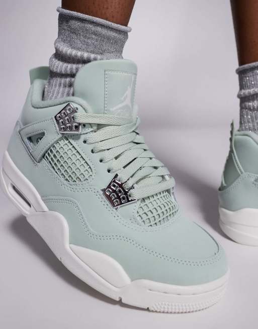 Nike Air Jordan 4 Retro sneakers in light green and white