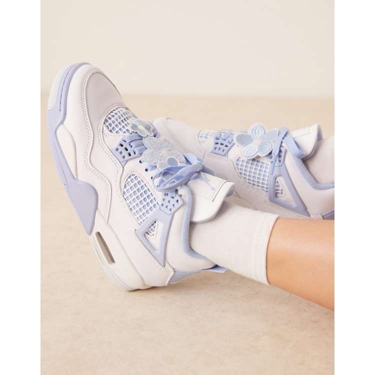Nike Air Jordan 4 Retro sneakers in white and light blue | ASOS