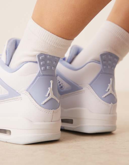 Nike Air Jordan 4 Retro sneakers in white and light blue