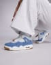 Nike Air Jordan 4 Retro sneakers in white and light blue