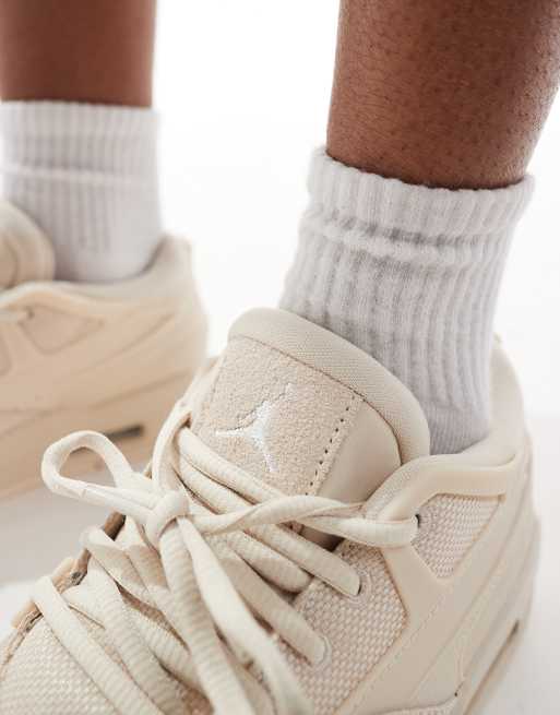 Air Jordan 4 RM trainers in off white