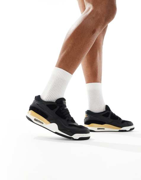 Nike Air Jordan 4 RM trainers in black and gold - view 1