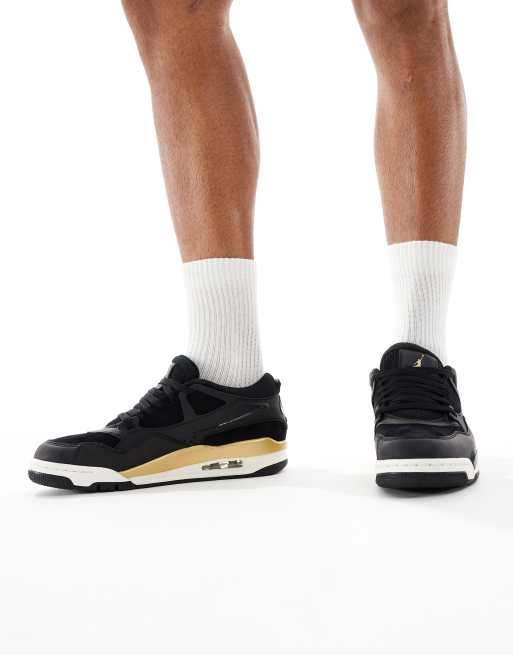 Nike Air Jordan 4 RM trainers in black and gold, 4 of 5