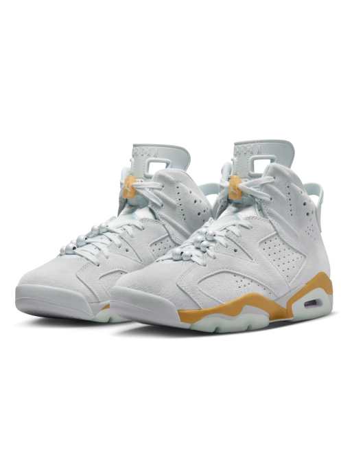 Nike Air Jordan 6 sneakers in light gray and gold