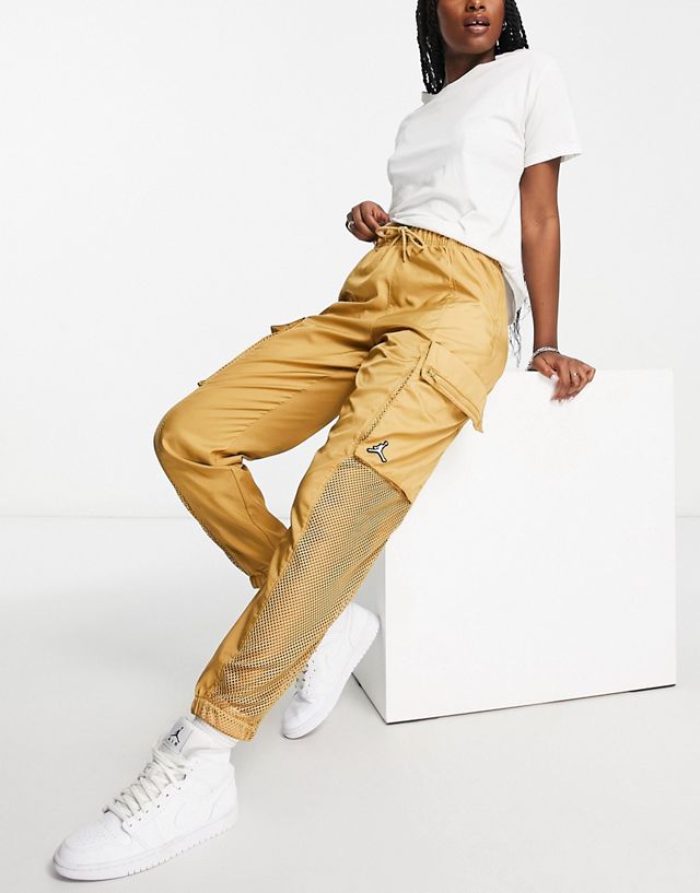Nike Air Jordan Essentials woven pants in gold