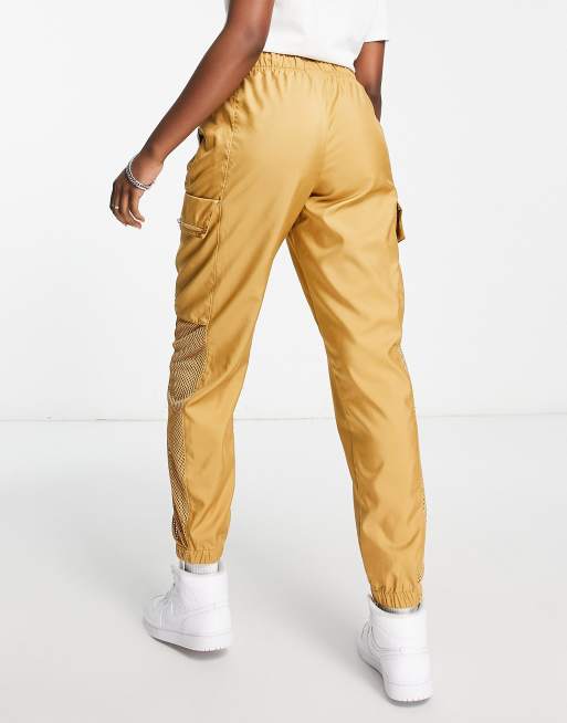 Nike Air Jordan Essentials woven pants in gold