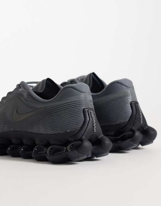 Nike Air Liquid Max trainers in grey and black, 4 of 5