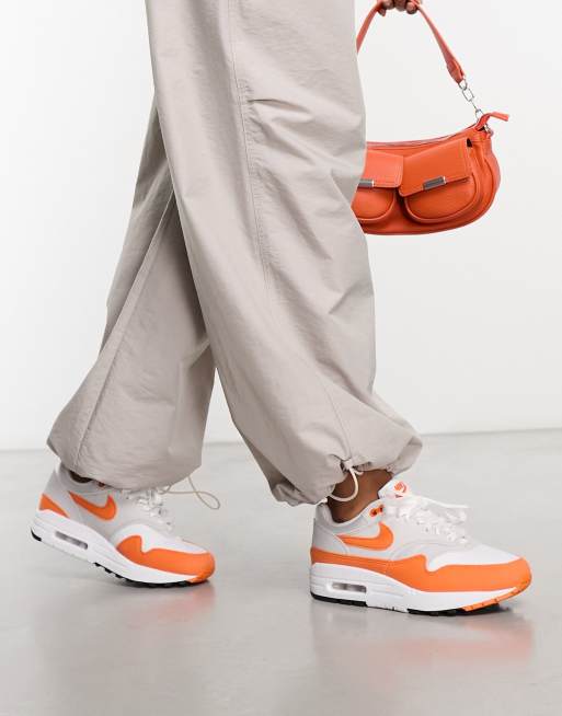 Nike orange and store grey shoes