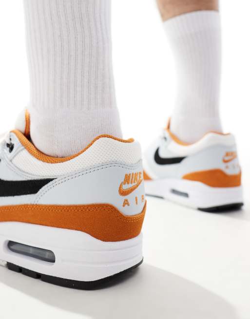 Nike Air Max 1 sneakers in white gray and orange