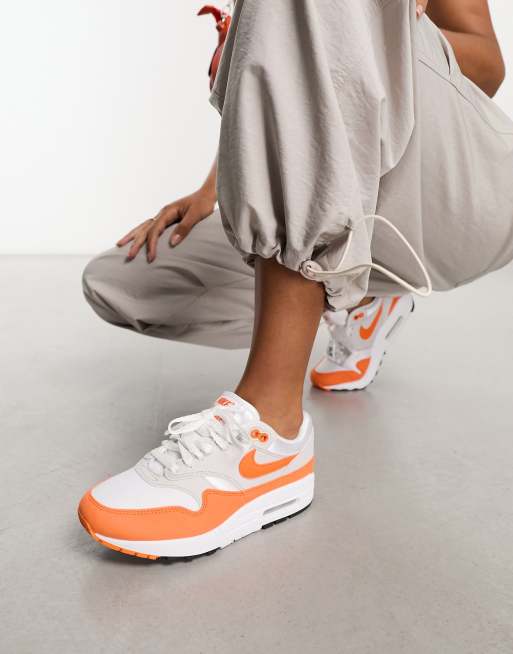 Nike Air Max 1 sneakers in gray and safety orange