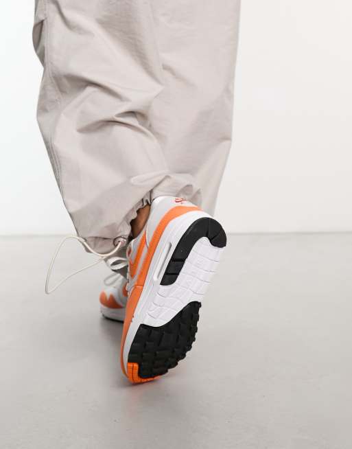 Nike Air Max 1 sneakers in gray and safety orange