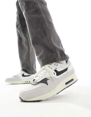 Nike Air Max 1 trainers in white and grey