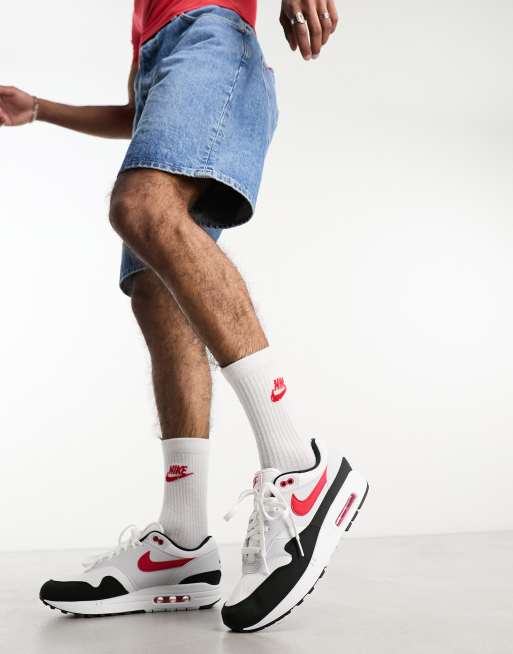 Nike Air Max 1 trainers in white red and black