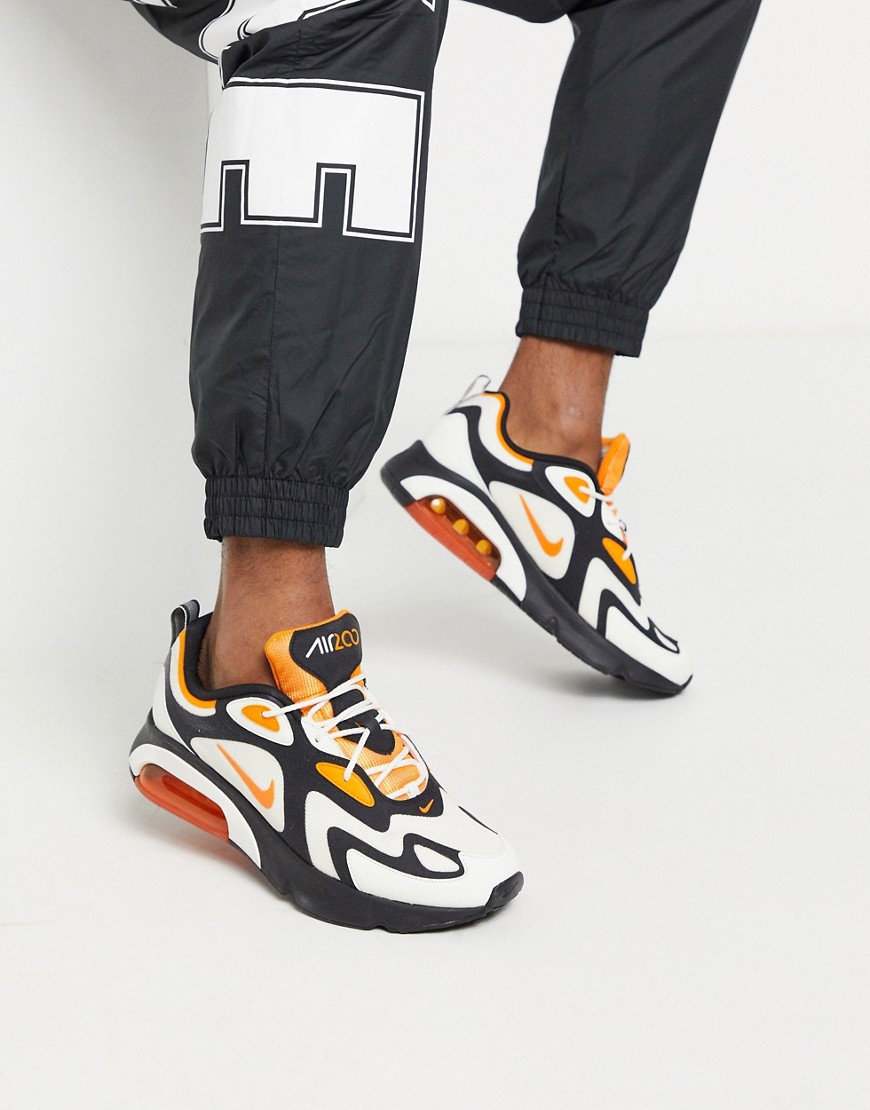 Nike Air Max 200 trainers in black/orange