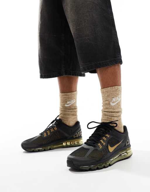 Nike Air Max 2013 Sneaker in Schwarz und Gold