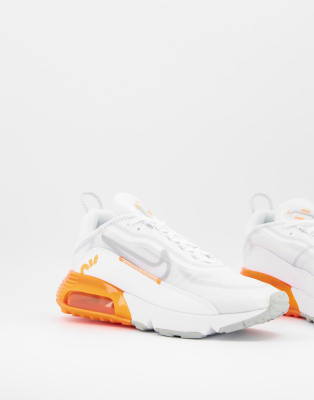 white and orange trainers