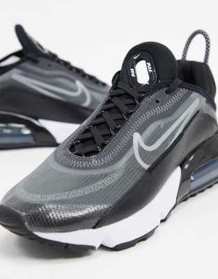 black and silver nike trainers