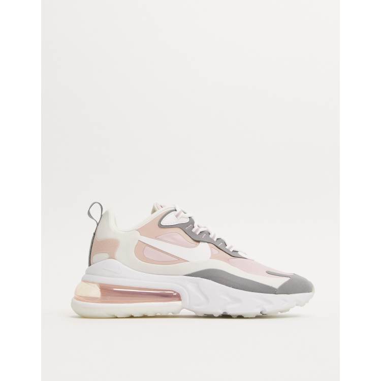 Pink hotsell grey nikes