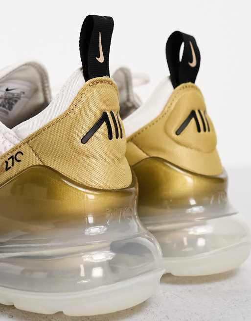 Nike Air Max 270 trainers in white and gold