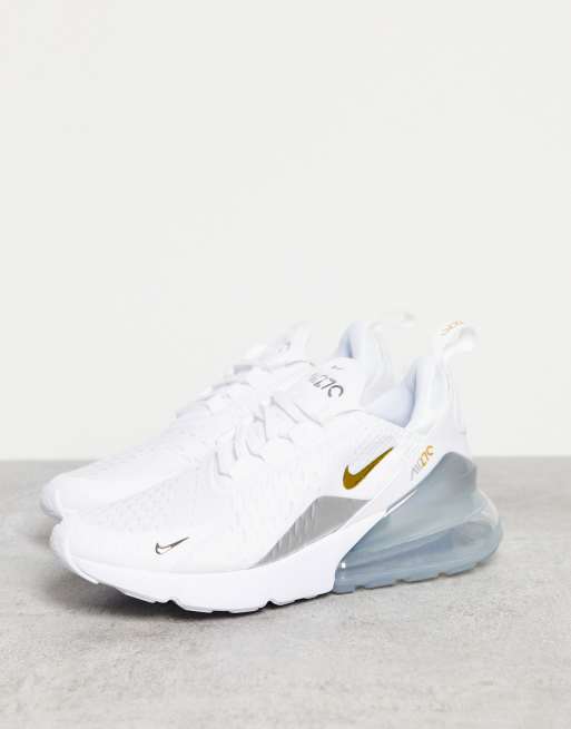 Nike trainers shop white and gold