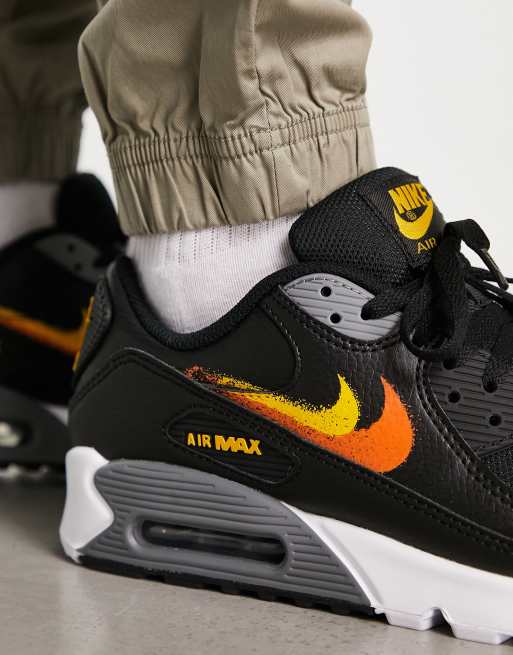 Nike Air Max 90 double swoosh spray trainers in black and orange