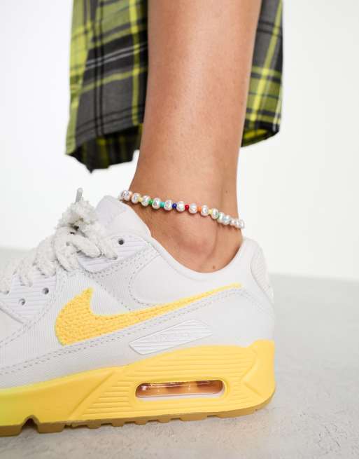 Nike blanche jaune sale