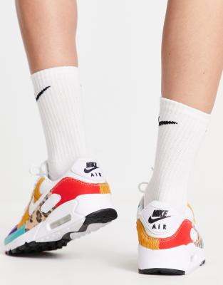 white and leopard nikes