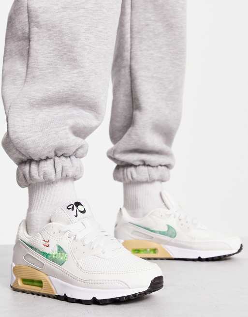 Green and white nike on sale trainers