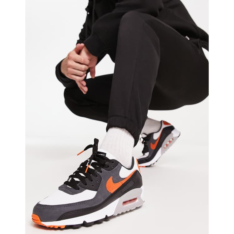 Nike air max 90 sneakers in black and orange | ASOS