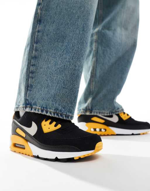 Nike Air Max 90 sneakers in black and yellow