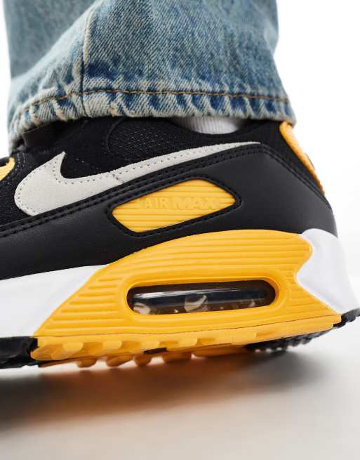 Nike shoes black and yellow hotsell