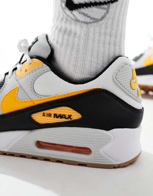 Nike Air Max 90 sneakers in white and yellow