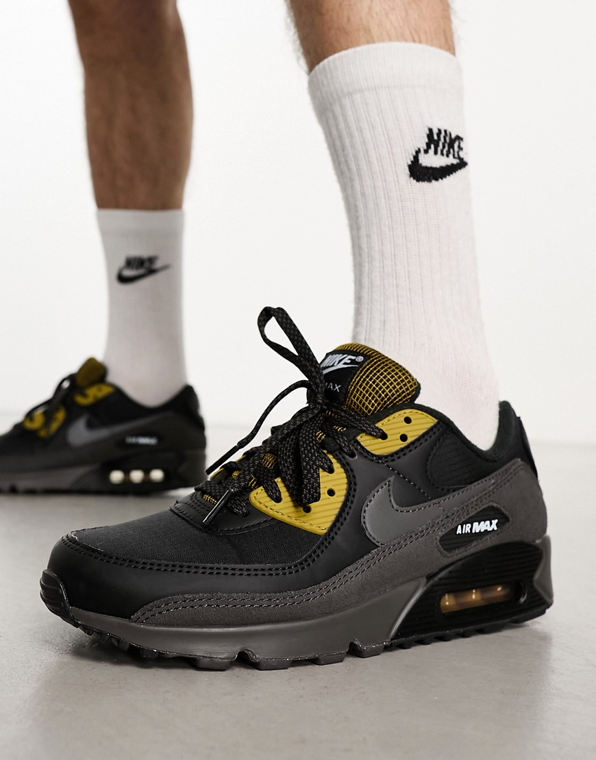 Nike Air Max 90 trainers in black and bronze