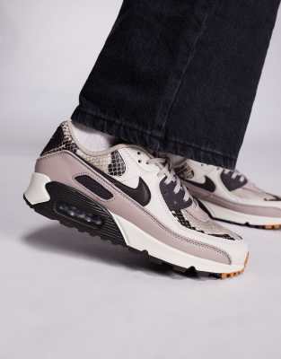 Nike Air Max 90 trainers in brown and snake print