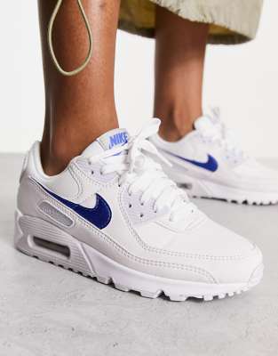 Nike Air Max 90 trainers in white and blue