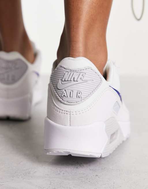 Nike Air Max 90 trainers in white and blue