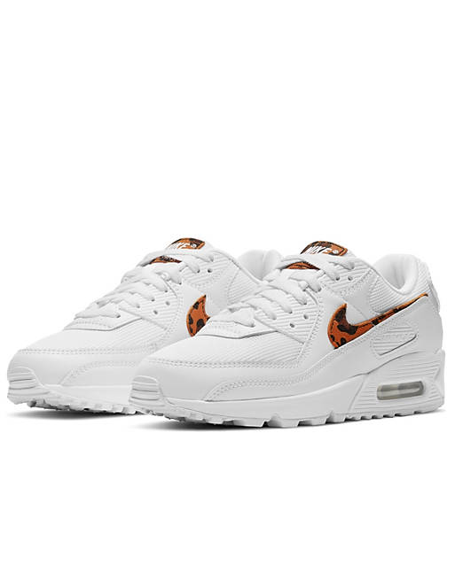 Nike Air Max 90 trainers in white and leopard print
