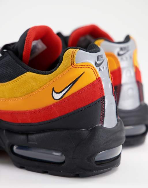 Nike Air Max 95 Ess trainers in black and orange