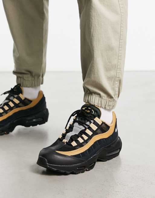 Nike Air Max 95 trainers in black and brown