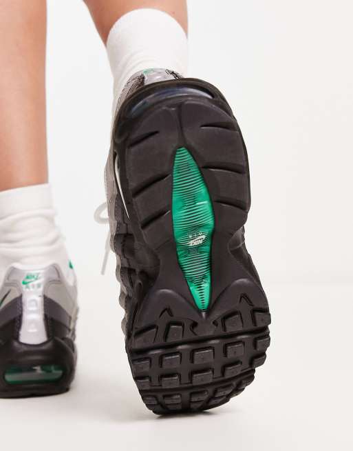 Nike Air Max 95 trainers in black and stadium green